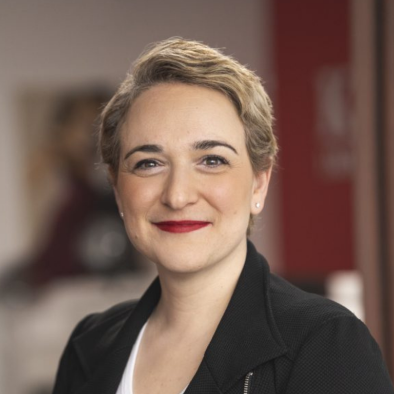 Mary Keyork Smiling in her headshot.