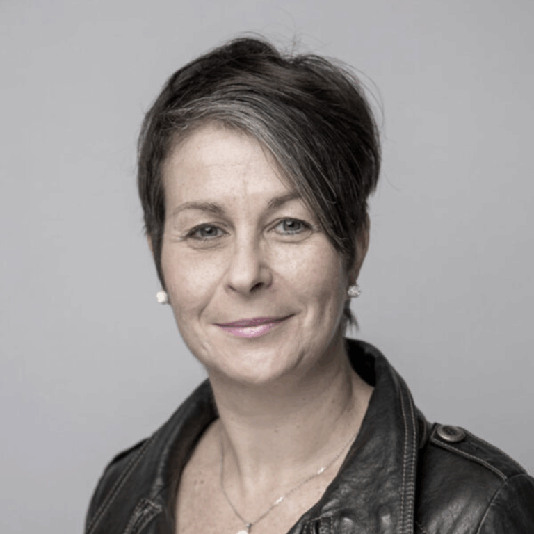 BJ smiling and looking into the camera.