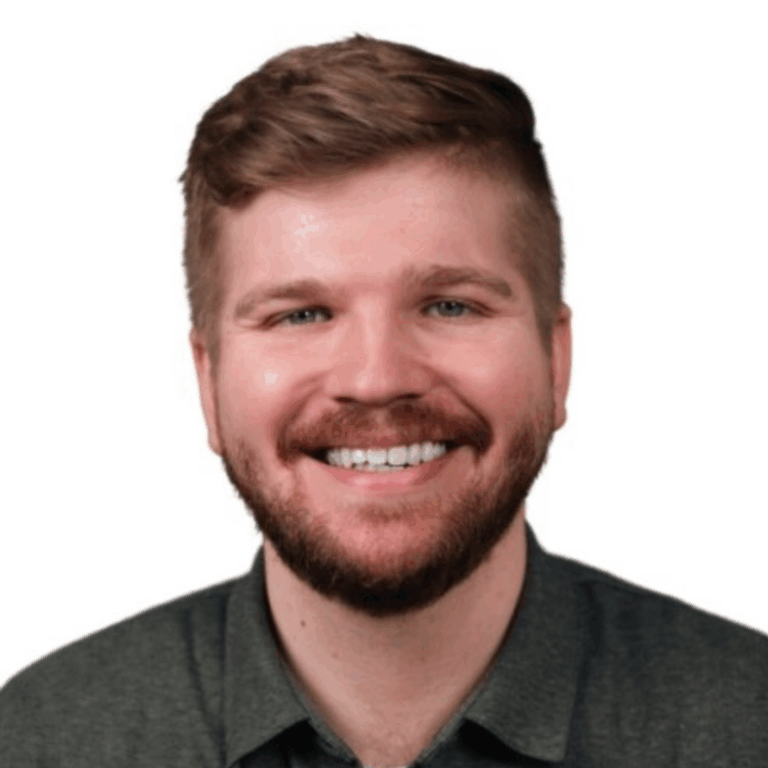 Cédric looking at the camera and smiling.