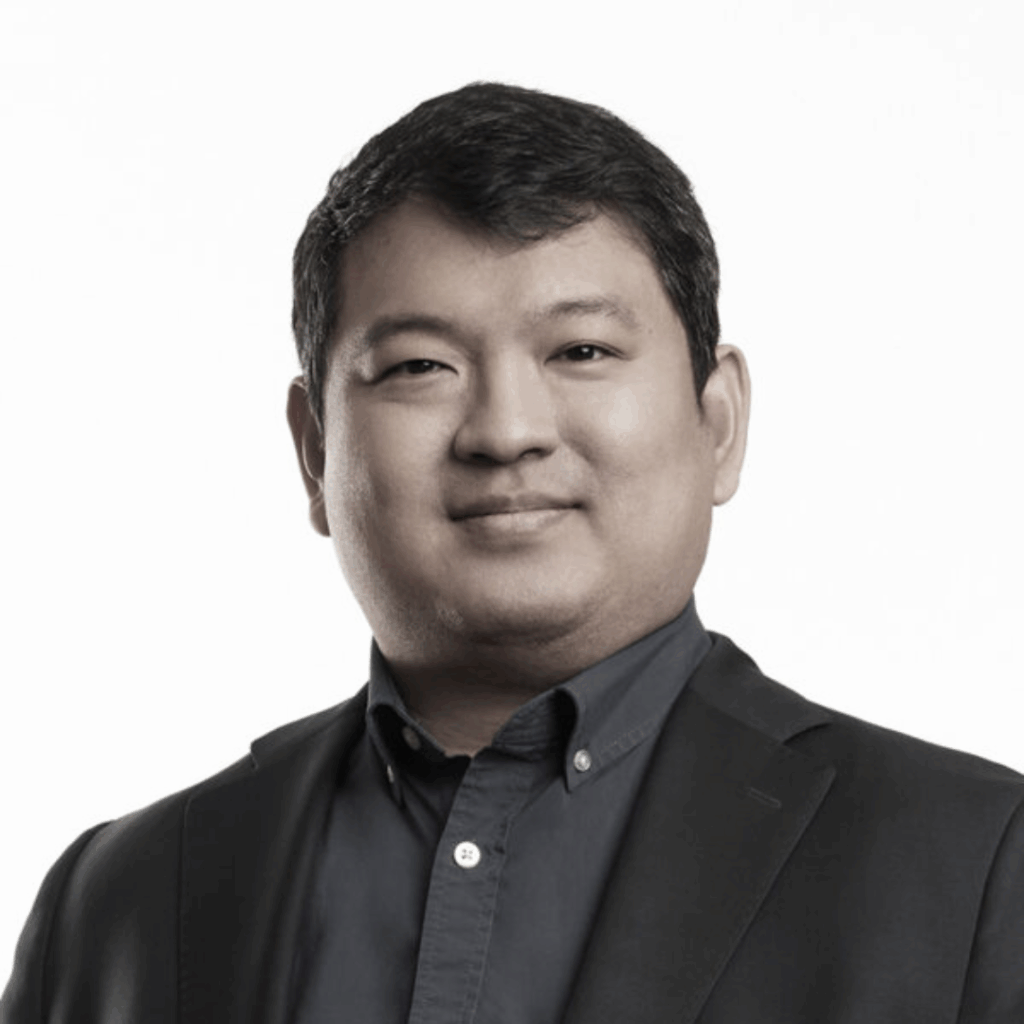 Ho Sung looking at the camera and smiling.