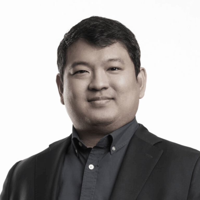 Ho Sung looking at the camera and smiling.