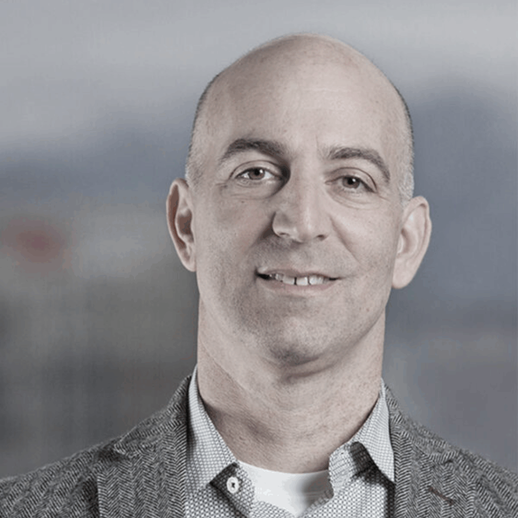 Jonathan looking at the camera and smiling.