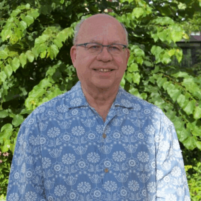 Max looking at the camera and smiling.